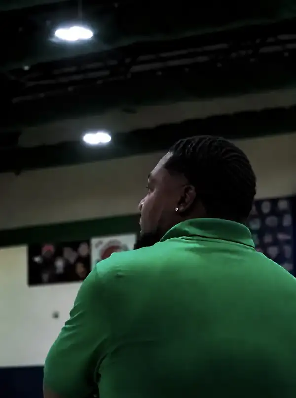 Coach Lee Louis